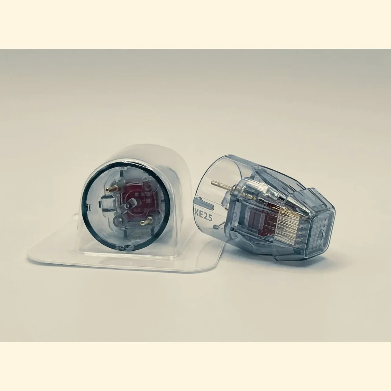 Two XE-25 microneedle tips shown together
