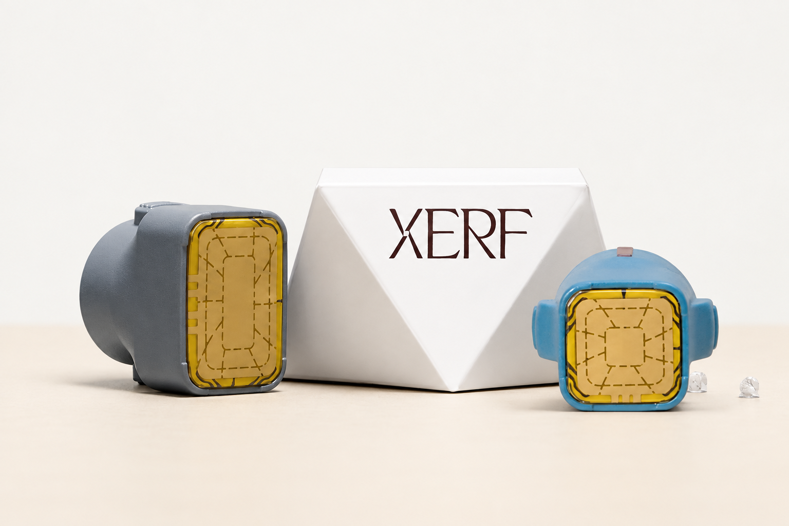 Illustrative reference image of two XERF treatment heads and a branded box on a warm neutral tabletop.